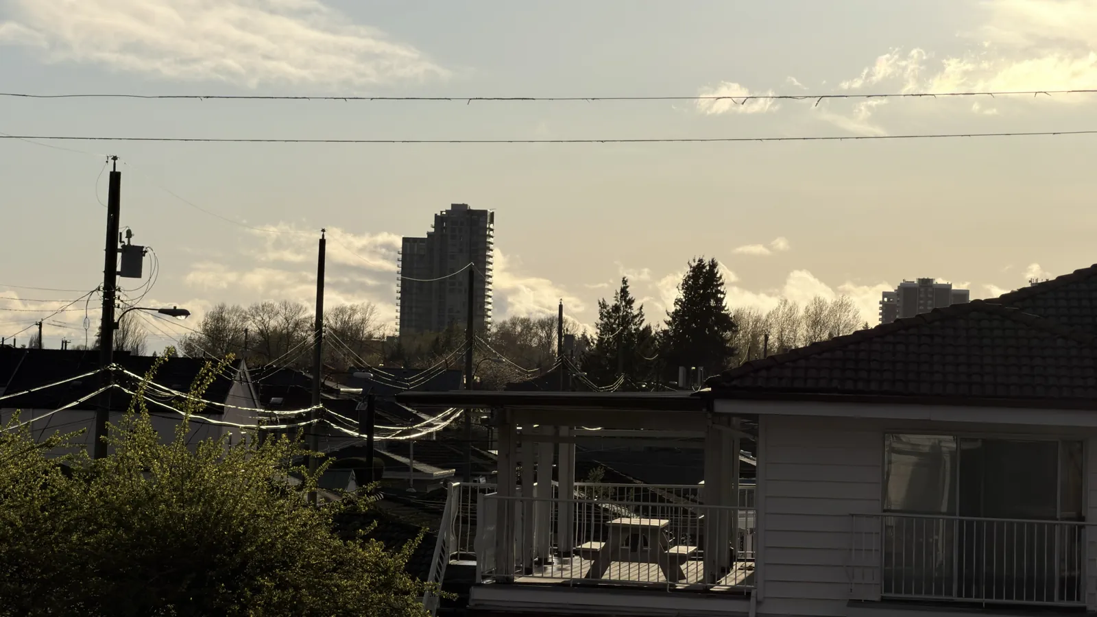 View of the Vancouver skyline at sunset from the North SEO office on E 56th Ave